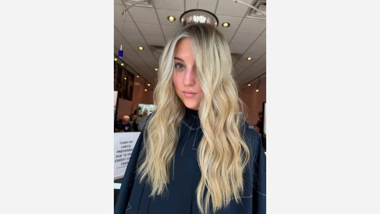 Buttery Blonde Locks with Light Brown Roots