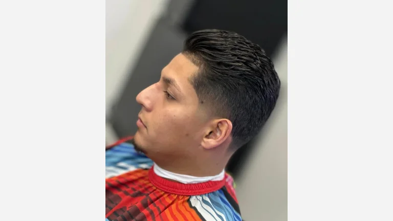 20 Trendy Slick Back Haircuts for Men 6 Slick Back Mid Taper Fade