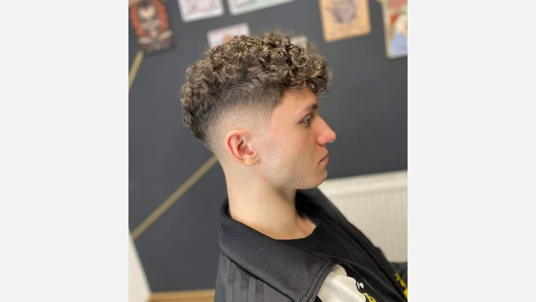 40 Stylish Taper Fade Curly Hair Ideas for Men 10 Curly Drop Fade with Shaved Sides