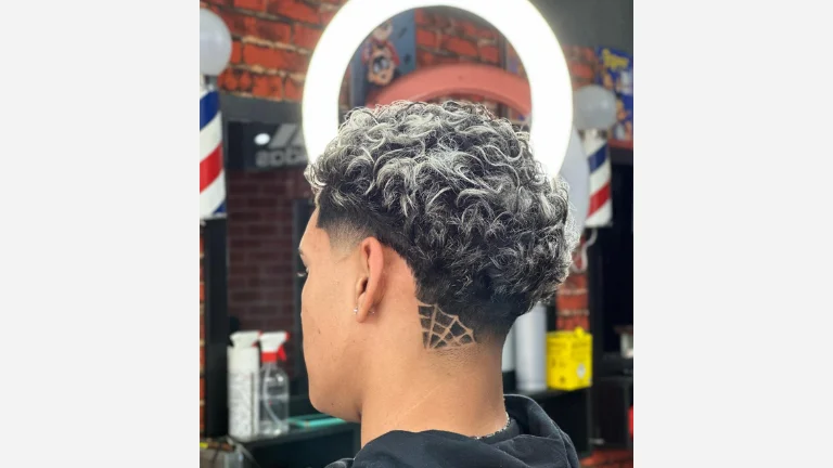 40 Stylish Taper Fade Curly Hair Ideas for Men 14 Low Fade with Cool Hair Design