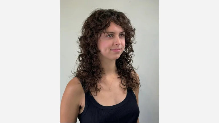 30 Chic Fringe Haircuts for a Fresh, Modern Vibe 15 Face-Framing Cut for Natural Curls