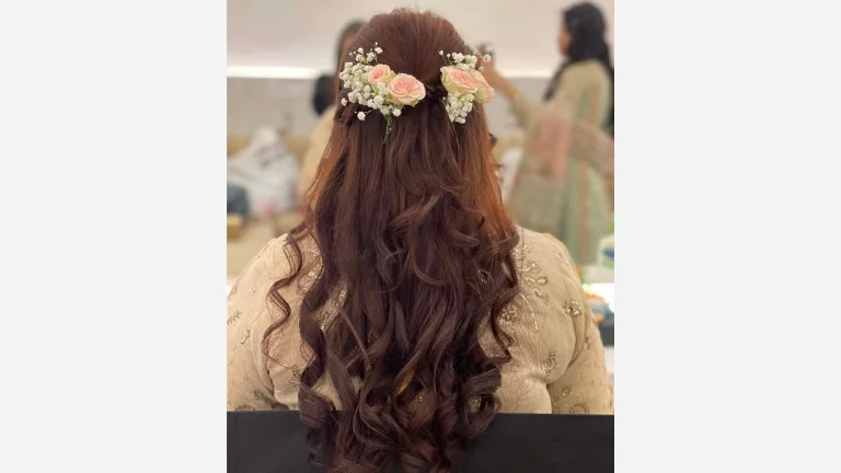 30 Elegant Prom Hairstyles for a Glamorous Look 23 Textured Waves and Flower Band