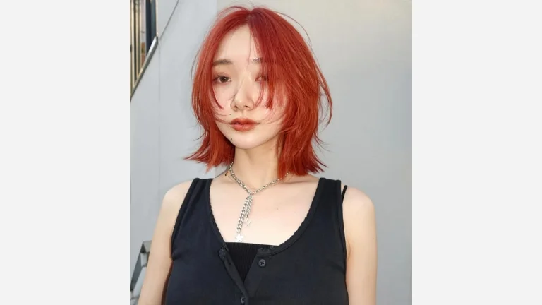 30 Hottest Ginger Hair Color Ideas for a Fiery Makeover 23 Orange Shoulder Length Cut