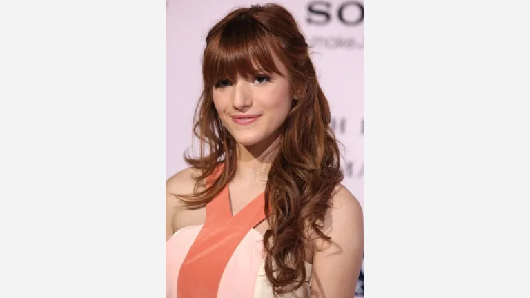 30 Chic Fringe Haircuts for a Fresh, Modern Vibe 26 26. Half Updo with Eye-Skimming Fringe