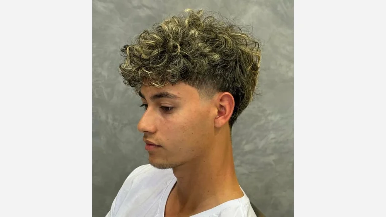 40 Stylish Taper Fade Curly Hair Ideas for Men 6 Taper Fade with Highlights