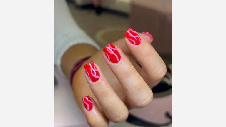 20 Nail Inspo That’s Trending Right Now 1 Stripes with Waves