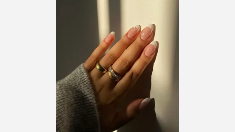 20 Nail Inspo That’s Trending Right Now 16 Negative Space Heart Accent