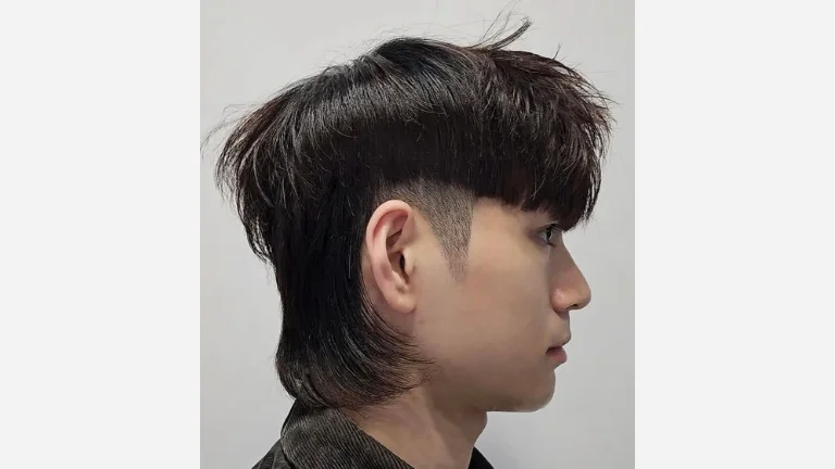 30 Best Wolf Cut Men Styles to Transform Your Look 23 Wolf Cut with Low Taper